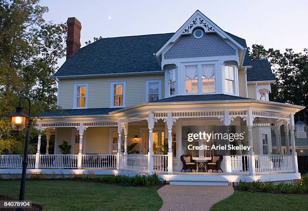 facade of new home at dusk - victorian style home stock pictures, royalty-free photos & images