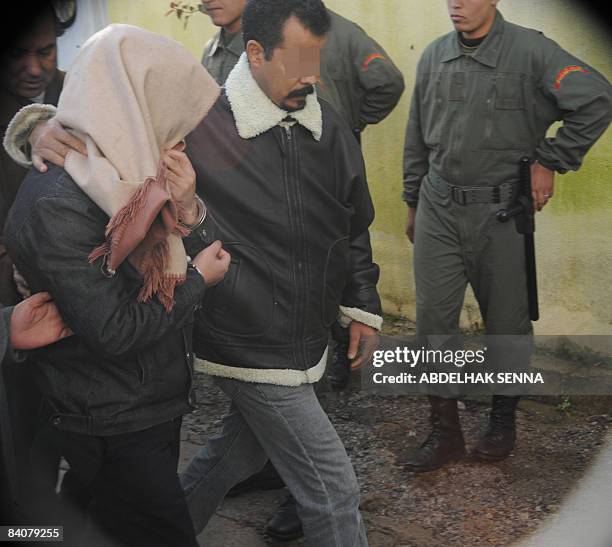 Moroccan Abdelilah Hriz is escorted to the anti-terrorist court in Sale, near the capital Rabat, on December 18, 2008. DNA testing has linked Hriz to...