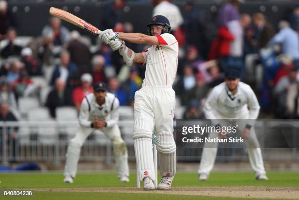 Ryan McLaren of Lancashire plays the pull shot during the County Championship Division One match between Lancashire and Warwickshire at Old Trafford...