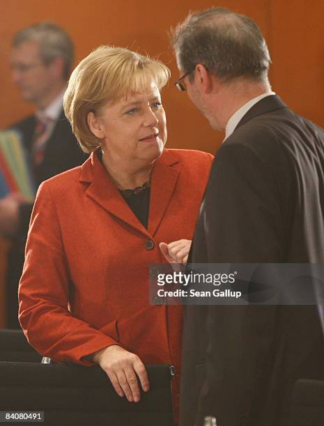 German Chancellor Angela Merkel chats with Brandenburg Governor Matthias Platzeck at a meeting between governors of Germany's 16 states and...