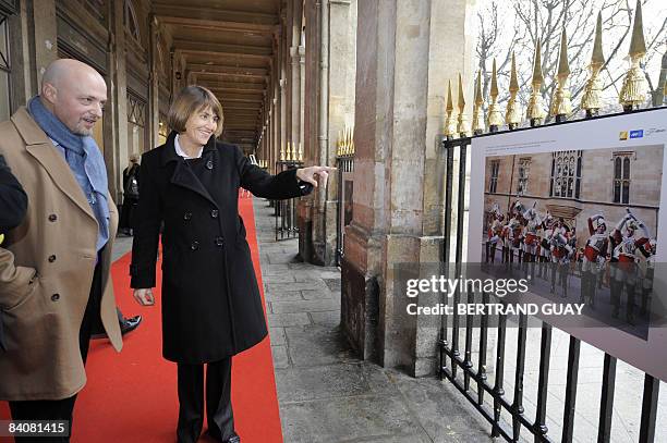 French Culture minister Christine Albanel and chairman and chief executive of the international news agency Agence France-Presse Pierre Louette look...