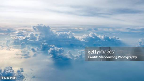 aerial shot of blue sky with clouds - wolkengebilde stock-fotos und bilder