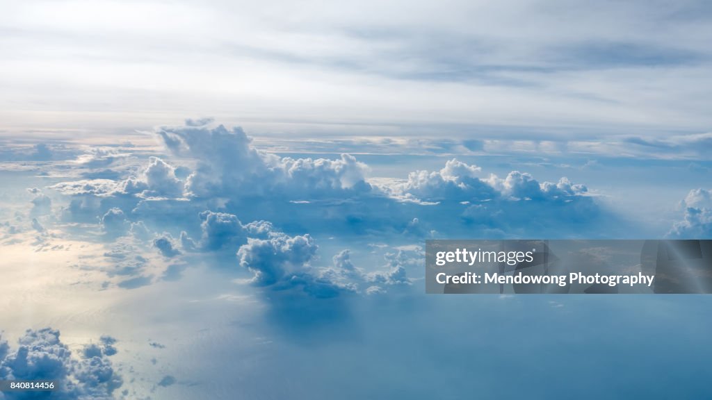 Aerial shot of blue sky with clouds