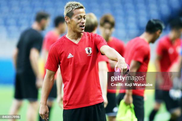 Keisuke Honda of Japan in action during a Japan training session/press conference ahead of the FIFA World Cup qualifier against Australia at Saitama...