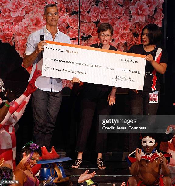 Choregrapher Jerry Mitchell accepts a check for $115,000 from Mac Aids Fund on behalf of Broadway Bares at Broadway Bares 18: Wonderland on June 22,...