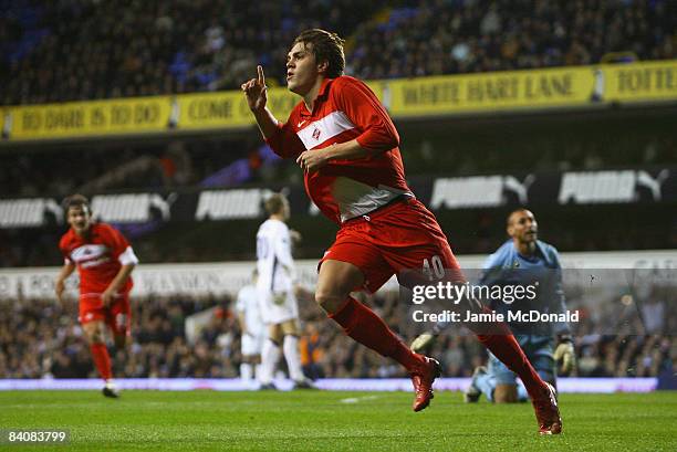 Artem Dzuba of Spartak celebrates after rounding Heurelho Gomes of Spurs to score his team's second goal during the UEFA Cup Group D match between...