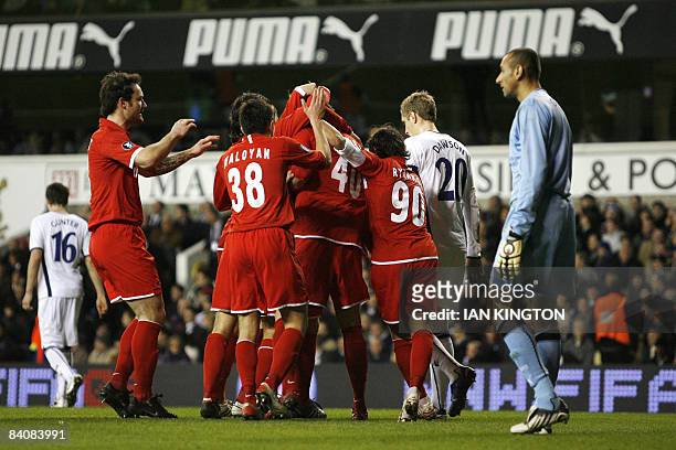 Spartak Moscow's Artem Dzuba celebrates after scoring with teammates against Tottenham Hotspurs, during a UEFA Cup Group D match at White Hart Lane...