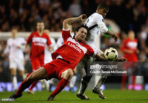 Martin Jiranek of Spartak is challenged by Fraizer Campbell of Spurs during the UEFA Cup Group D match between Tottenham Hotspur and Spartak Moscow...