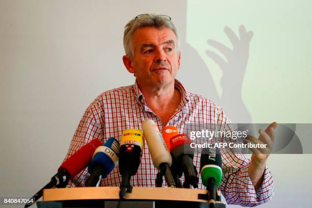 Ryanair CEO Michael O'Leary who has expressed an interest in buying up parts of insolvent Air Berlin attends a press conference in Berlin on August...