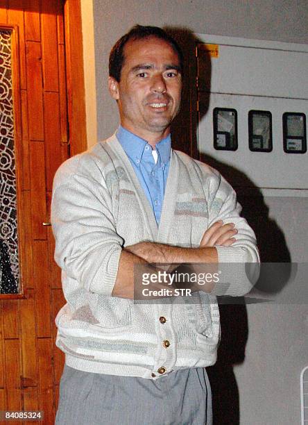 Attacks-Guantanamo-Algeria-rights" Algerian-born Bosnian Mustafa Ait Idir poses in front of his house in Sarajevo on 16 December, 2008. Idir and two...