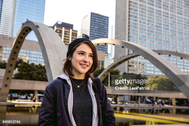young woman portrait in downtown toronto - toronto downtown stock pictures, royalty-free photos & images