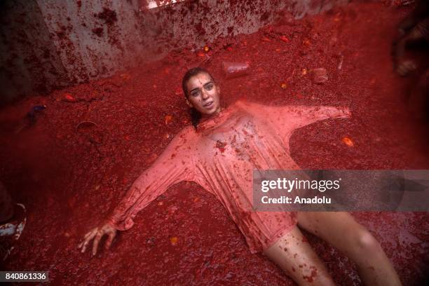 Revelers enjoy in tomato pulp during the annual La Tomatina festival in Bunol district of Valencia, Spain on August 30, 2017.