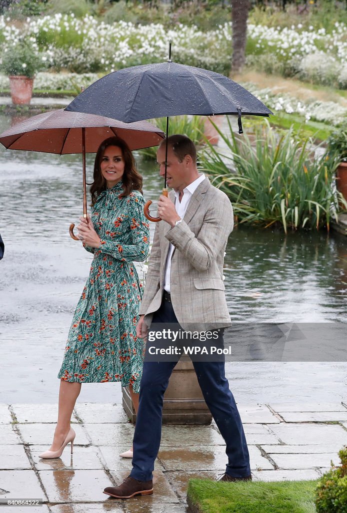 The Duke And Duchess Of Cambridge And Prince Harry Visit The White Garden In Kensington Palace