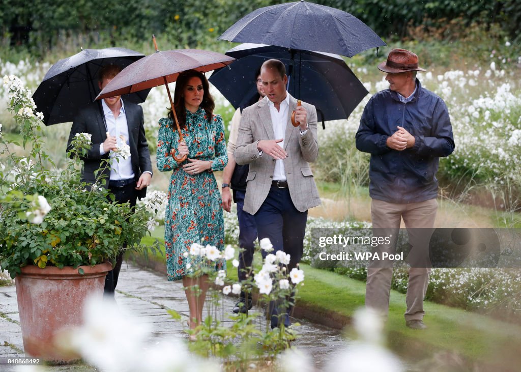 The Duke And Duchess Of Cambridge And Prince Harry Visit The White Garden In Kensington Palace