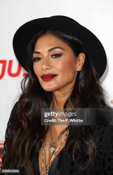 Nicole Scherzinger poses for a photo during The X Factor Series 14 red carpet press launch at Picturehouse Central on August 30, 2017 in London,...