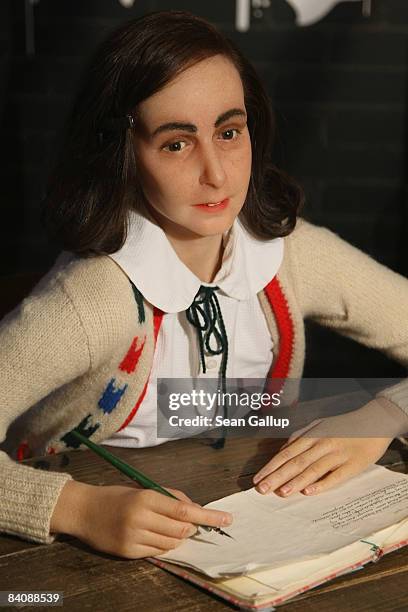 Wax figure of Anne Frank stands on display on its first day for the public at Madame Tussauds on December 19, 2008 in Berlin, Germany. Anne Frank, a...