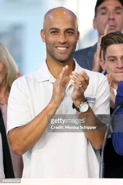 Former professional tennis player and on-air analyst James Blake rings the Nasdaq Stock Market Opening Bell at NASDAQ MarketSite on August 30, 2017...