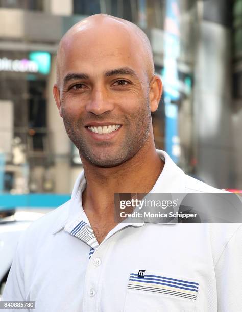 Former professional tennis player and on-air analyst James Blake rings the Nasdaq Stock Market Opening Bell at NASDAQ MarketSite on August 30, 2017...