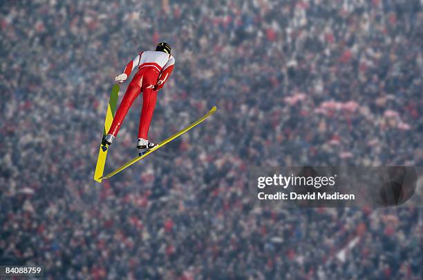 ski jumper over crowd - backhoppning bildbanksfoton och bilder
