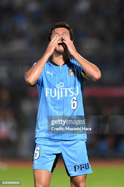 Yusuke Tasaka of Kawasaki Frontale looks on during the J.League Levain Cup quarter final first leg match between Kawasaki Frontale and FC Tokyo at...