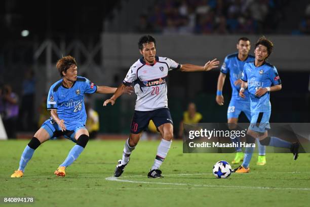 Ryoichi Maeda of FC Tokyo and Ko Itakura of Kawasaki Frontale compete for the ball during the J.League Levain Cup quarter final first leg match...