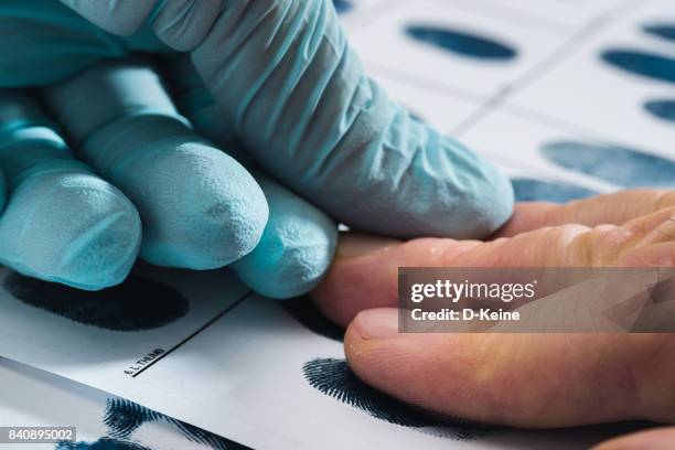 fingerprints - criminal investigation stock pictures, royalty-free photos & images