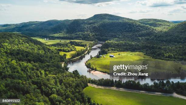 mountain and river - québec stock pictures, royalty-free photos & images