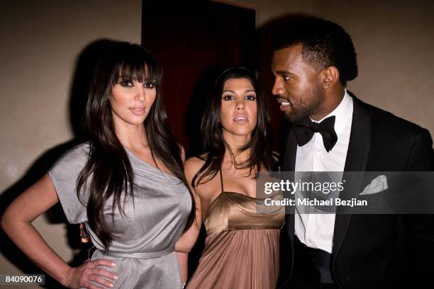 Kim Kardashian, Kourtney Kardashian and Kanye West at Flaunt Magazine's 10th Anniversary Party and Annual Holiday Toy Drive at the Wayne Kao Mansion...