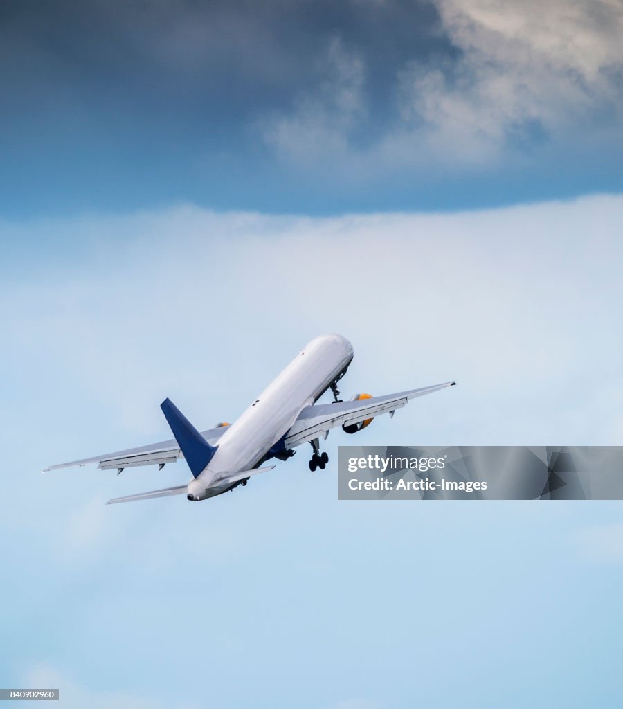 With Flight Commercial Airplane In Flight High-Res Stock Photo - Getty Images