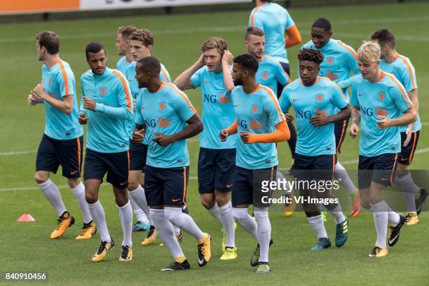 The payers of Netherlands U21 during the warming up during the training session of Netherlads U21 at the KNVB training centre on August 30, 2017 in...