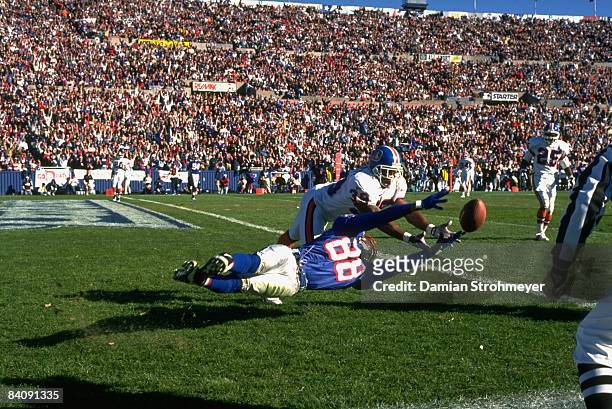 New England Patriots Terry Glenn in action, attempting catch vs Denver Broncos Ray Crockett . Foxboro, MA CREDIT: Damian Strohmeyer