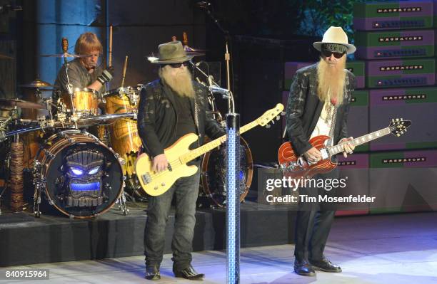 Frank Beard, Dusty Hill, and Billy Gibbons of ZZ Top performs during the band's "Tonnage" tour at The Mountain Winery on August 29, 2017 in Saratoga,...