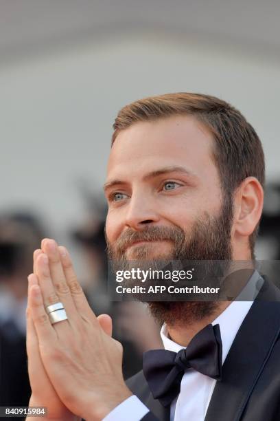 Italian actor Alessandro Borghi arrives for the opening ceremony of the 74th Venice Film Festival and the premiere of the movie "Downsizing", on...