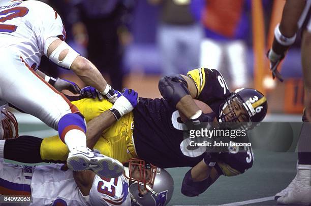 Pittsburgh Steelers Jerome Bettis in action vs New England Patriots Chris Slade . Pittsburgh, PA 1/3/1998 CREDIT: John Iacono