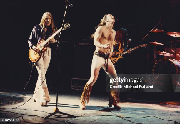 Guitarist Stanley Knight and lead singer Jim 'Dandy' Mangrum of American southern rock group Black Oak Arkansas perform on stage, 1974.
