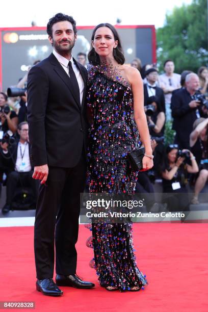 Jury member Rebecca Hall and Morgan Spector walk the red carpet ahead of the 'Downsizing' screening and Opening Ceremony during the 74th Venice Film...