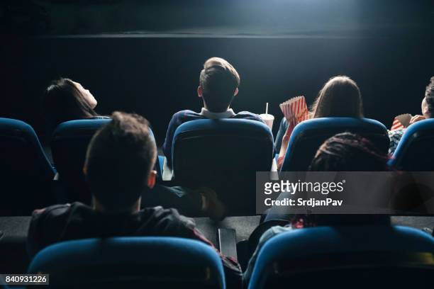 movies night - cinema audience imagens e fotografias de stock