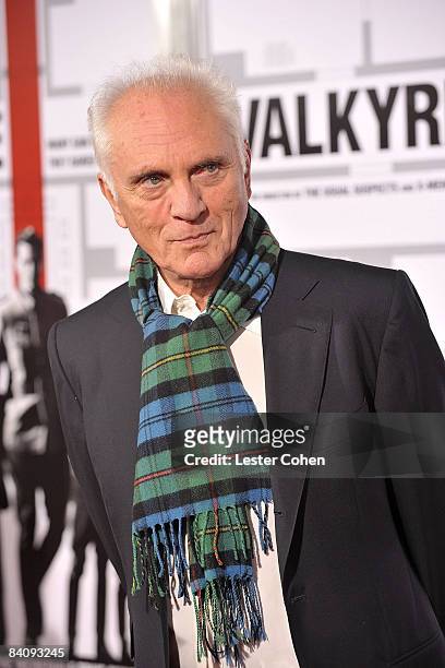 Actor Malcolm McDowell arrives on the red carpet of the Los Angeles premiere of "Valkyrie" at the Directors Guild of America on December 18, 2008 in...