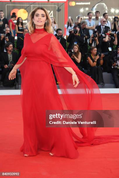Jury member Greta Scarano walks the red carpet ahead of the 'Downsizing' screening and Opening Ceremony during the 74th Venice Film Festival at Sala...
