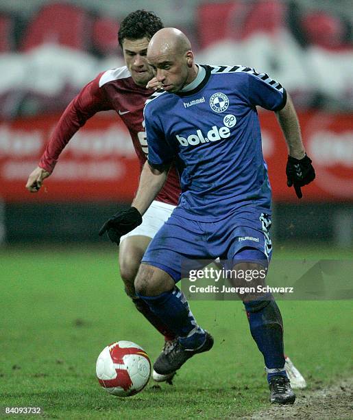 Robert Mainka of Essen and Thomas Piorunek of Lotte battle for the ball during the Regional Liga match between Rot-Weiss Essen and Sportfreunde Lotte...