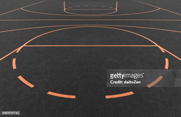tartan covered outdoor basketball court with orange playing field lines - streetball stock pictures, royalty-free photos & images