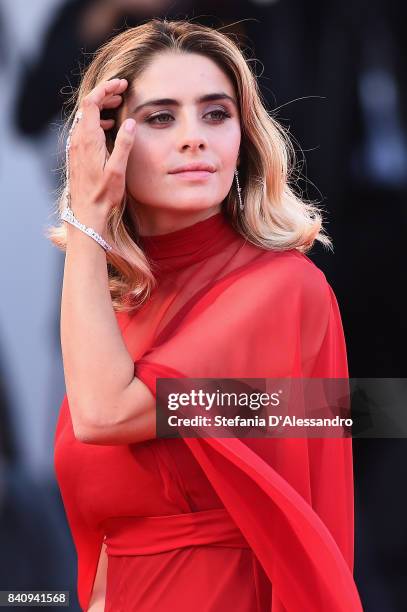 Greta Scarano walks the red carpet ahead of the 'Downsizing' screening and Opening Ceremony during the 74th Venice Film Festival at Sala Grande on...