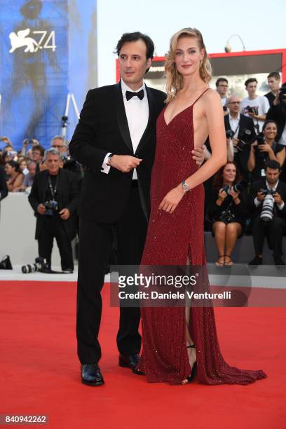 Eva Riccobono and Matteo Ceccarini walk the red carpet ahead of the 'Downsizing' screening and Opening Ceremony during the 74th Venice Film Festival...