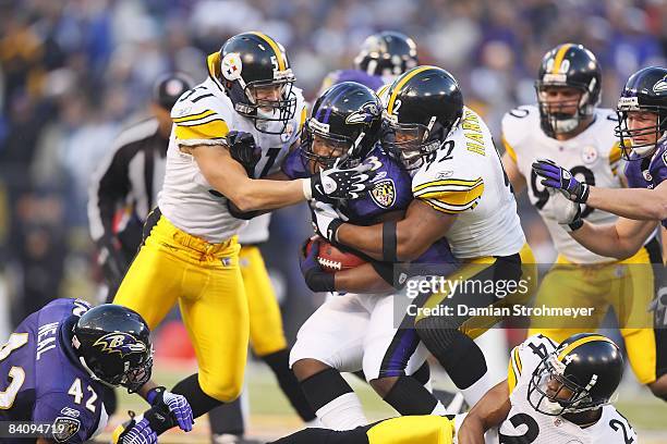 Pittsburgh Steelers James Farrior and James Harrison in action, making tackle vs Baltimore Ravens Le'Ron McClain . Baltimore, MD CREDIT: Damian...