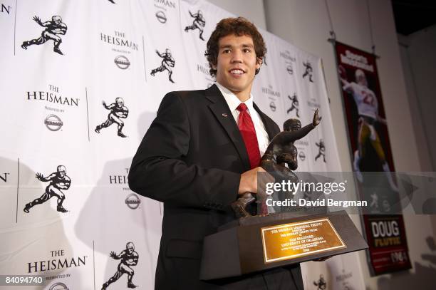 Heisman Trophy Presentation: Portrait of Oklahoma QB Sam Bradford posing with award during press conference at Sports Museum of America. New York, NY...