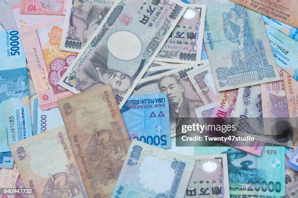 asia currency - all asian currencies stock pictures, royalty-free photos & images