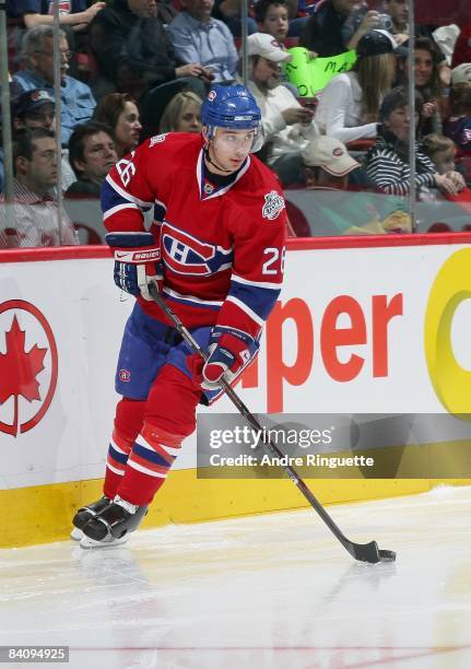 Josh Gorges of the Montreal Canadiens stickhandles the puck against the Calgary Flames at the Bell Centre on December 9, 2008 in Montreal, Quebec,...