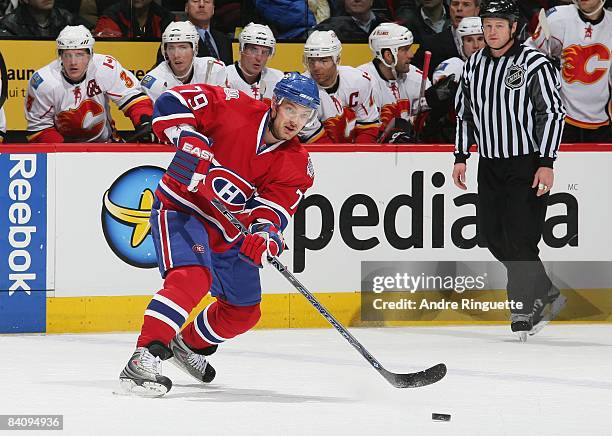 Andrei Markov of the Montreal Canadiens passes the puck against the Calgary Flames at the Bell Centre on December 9, 2008 in Montreal, Quebec, Canada.