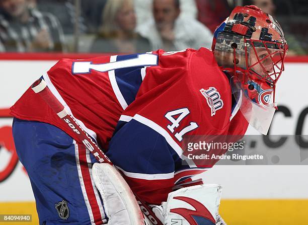 Jaroslav Halak of the Montreal Canadiens looks on during a stoppage in play against the Calgary Flames at the Bell Centre on December 9, 2008 in...