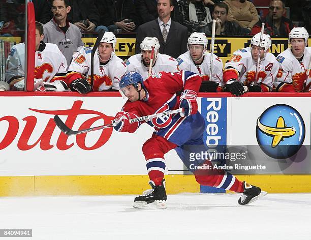 Patrice Brisebois of the Montreal Canadiens fires a slapshot against the Calgary Flames at the Bell Centre on December 9, 2008 in Montreal, Quebec,...